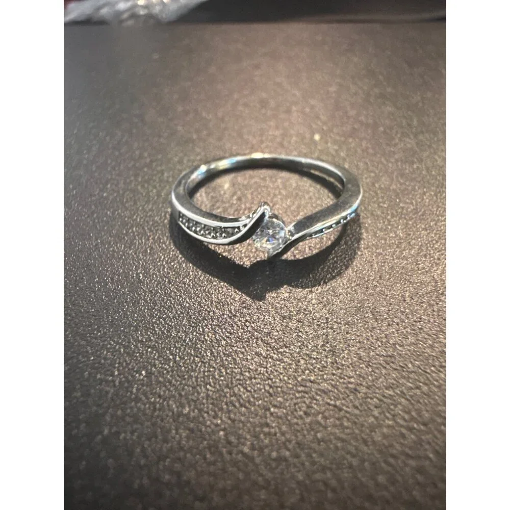 Sterling Silver Plated Twist Engagement Ring With Cubic Zirconia Stone